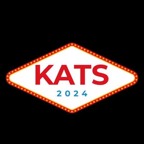 A flattened diamond, similar to the famous 'Welcome to Las Vegas!' sign, with KATS in large red lettering, and the year 2024 in smaller blue lettering underneath.