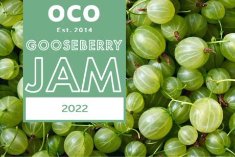 An image of many gooseberries as the background, with a green box on the left side holding the content. OCO Est. 2014 sits at the top of the box, with Gooseberry Jam 2022 sitting underneath.